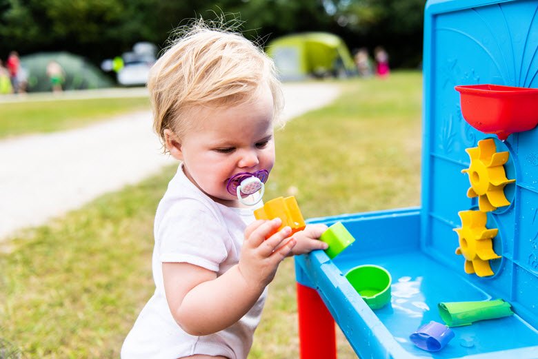 Toddler-Playing-With-Water-Table