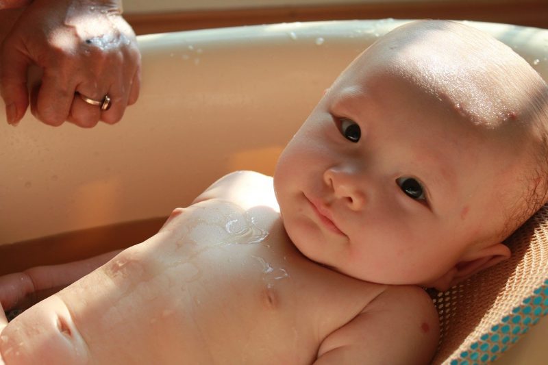 Baby taking bath