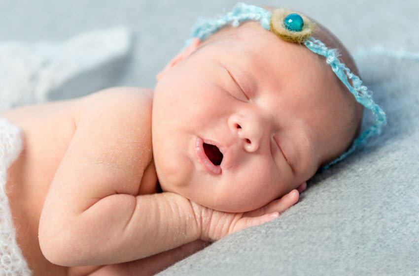 newborn sleeping with mouth open
