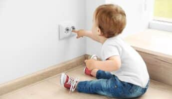 Baby Playing With Electrical Outlets