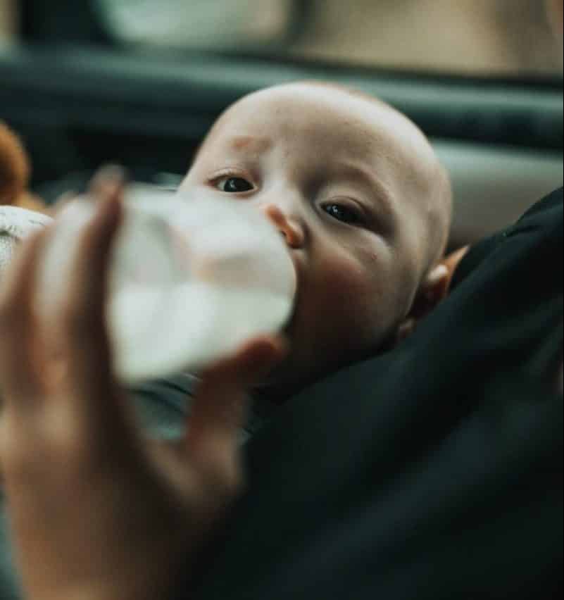 feeding baby with a bottle