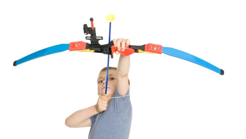 boy with bow and arrow toy