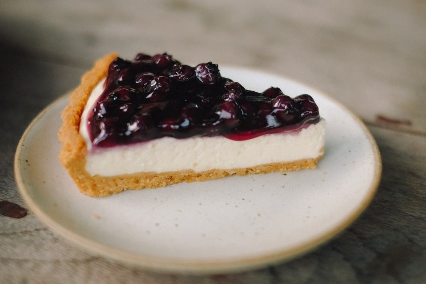 a slice of blueberry cheesecake