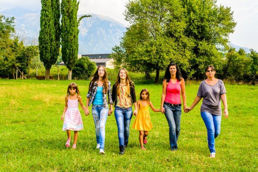 family of female members walking