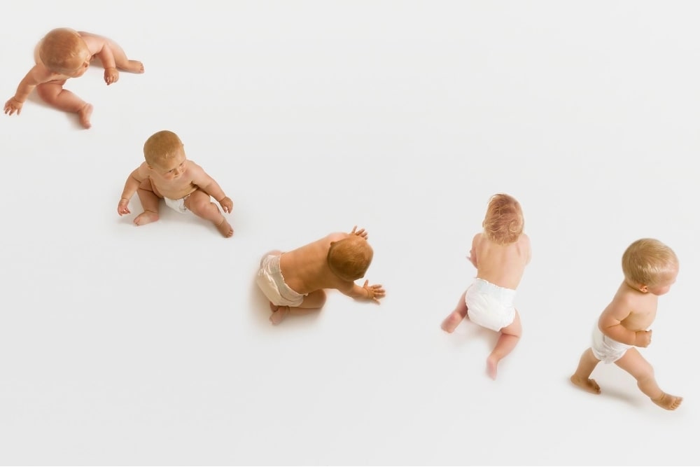 baby stages of learning to crawl and walk