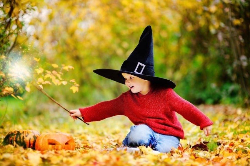 boy wearing a wizard hat