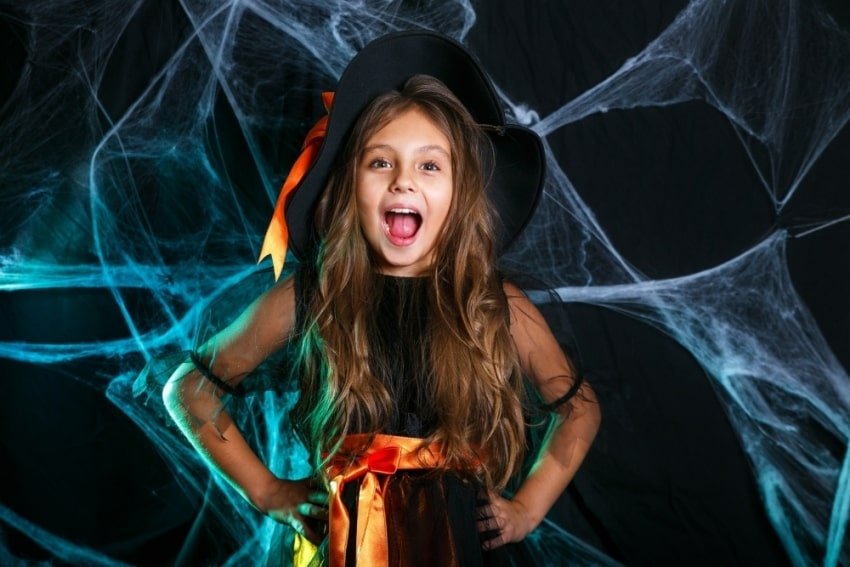 girl dressed as a witch