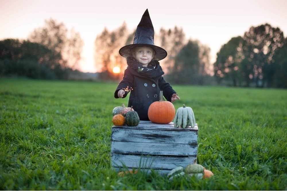 toddler dressed as a witch