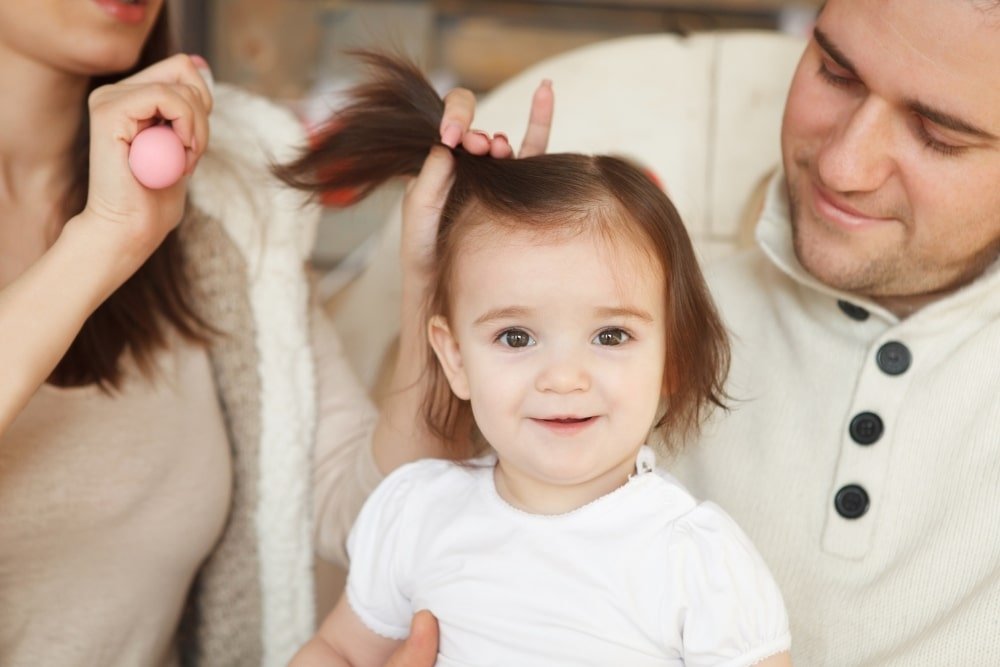 toddler hair being styled
