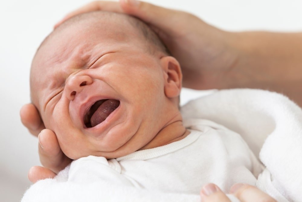 Baby Cries During Bottle Feeding: Fixing Feeding Problems