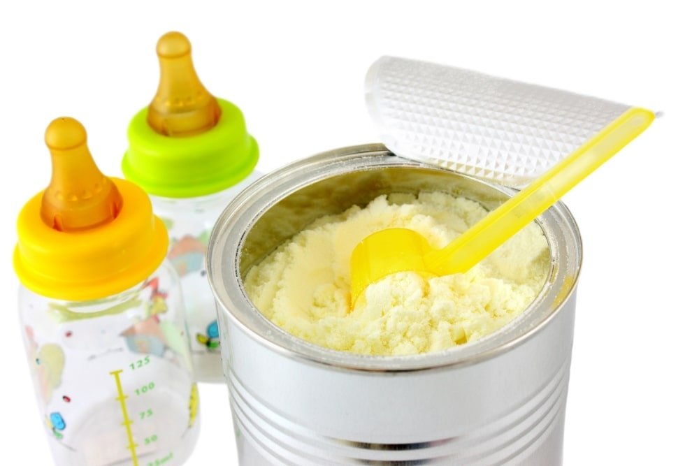 baby formula and two milk bottles