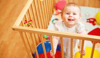 Is Your Toddler Climbing Out of the Crib But Isn't Ready for a Bed? (5 Solutions)