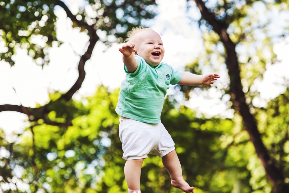 happy baby up in the air