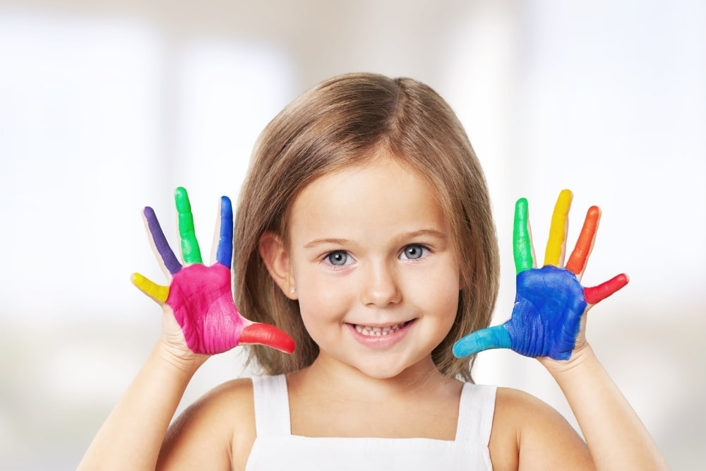 girl with painted hands