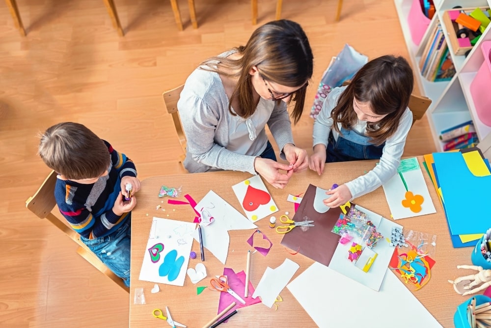 kids with teacher paint
