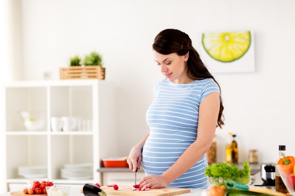 pregnant cooking food
