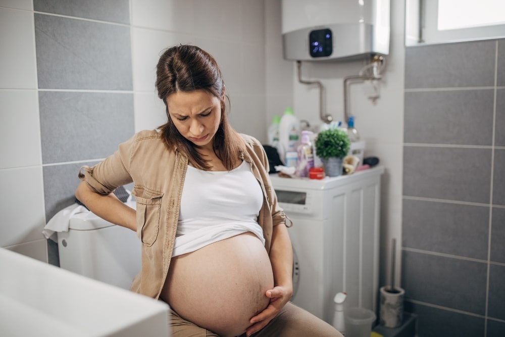 pregnant woman in toilet