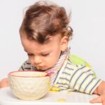 Why Your Toddler Is Spitting Out Food and What To Do About It
