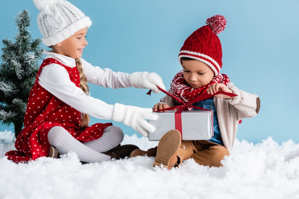 Children in hats and winter outfit