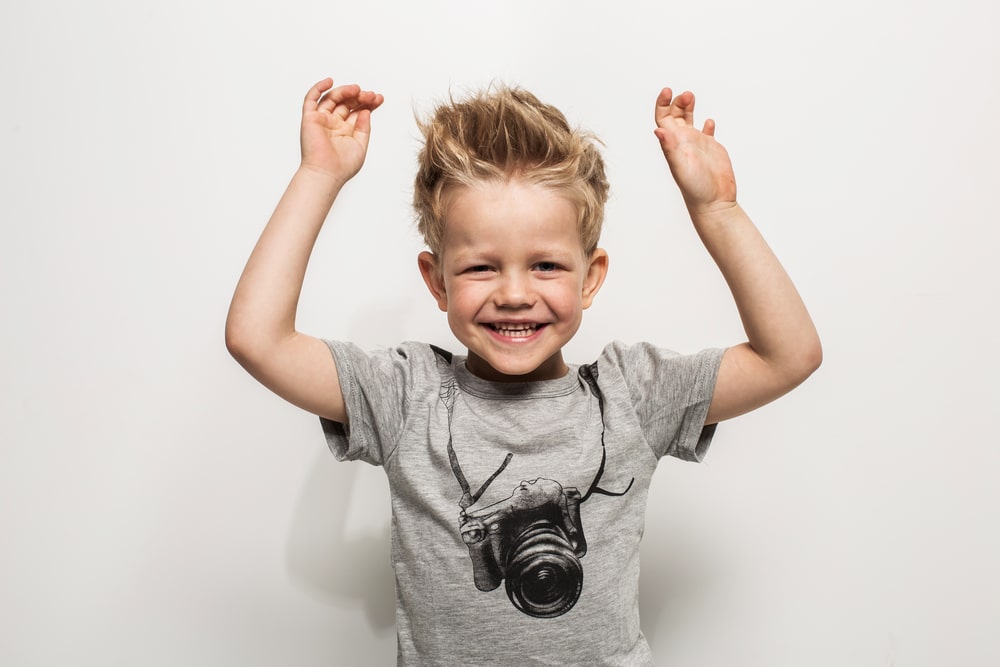 Portrait of happy joyful beautiful little boy