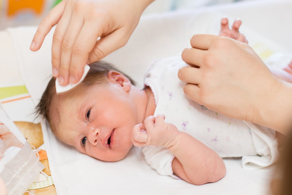Cleaning newborn baby skin