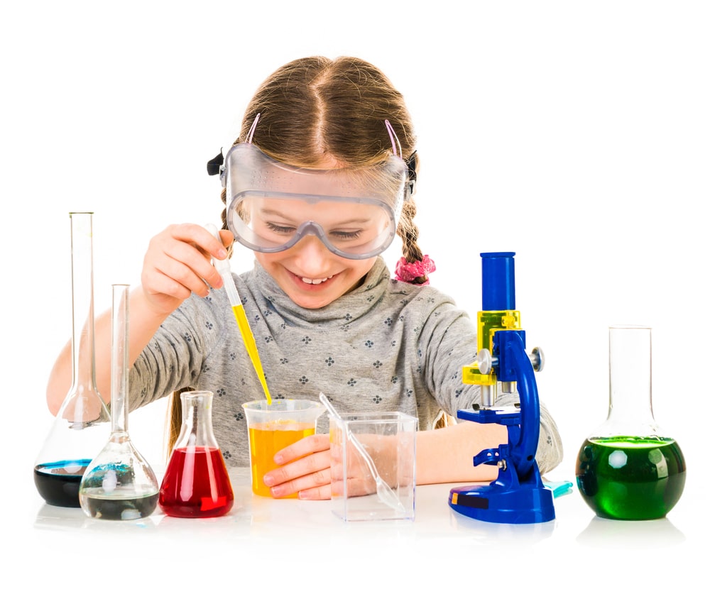 Girl with flasks for chemistry