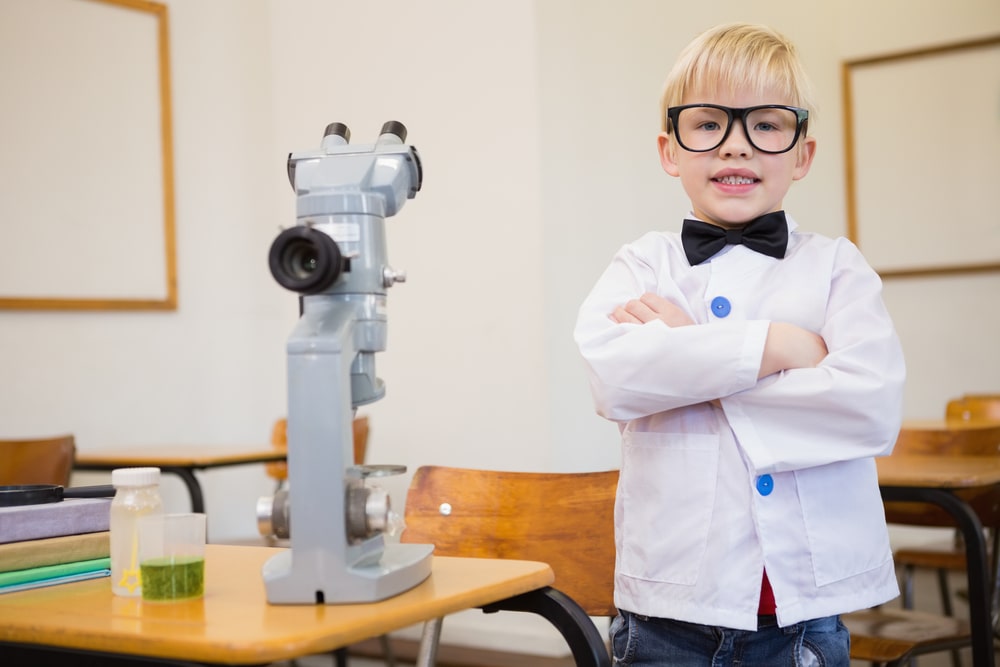 Pupil dressed up as scientist in classroom