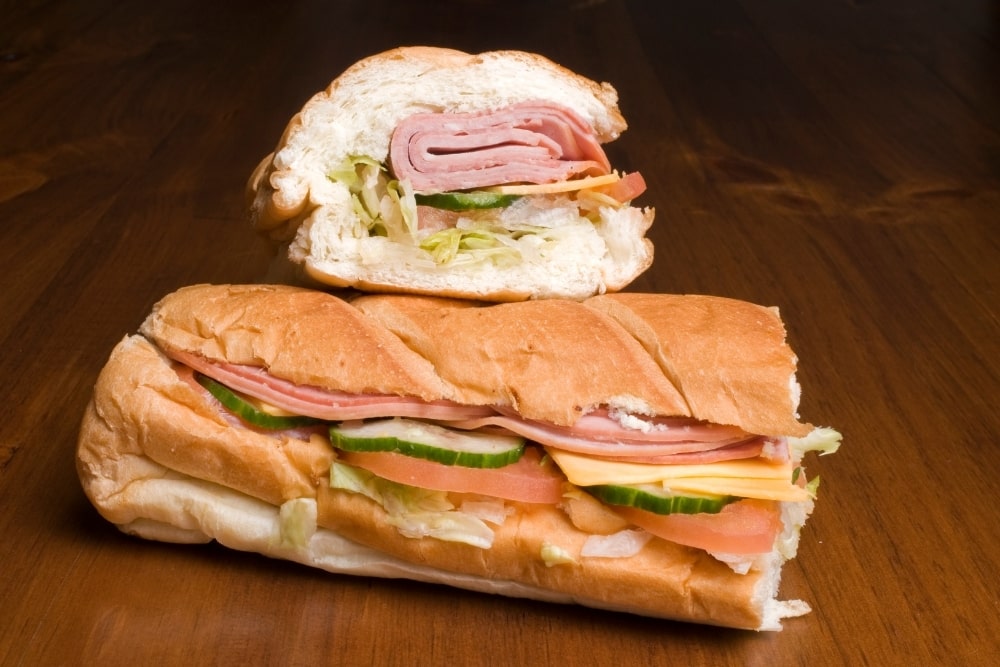 halfed subway sandwiches food
