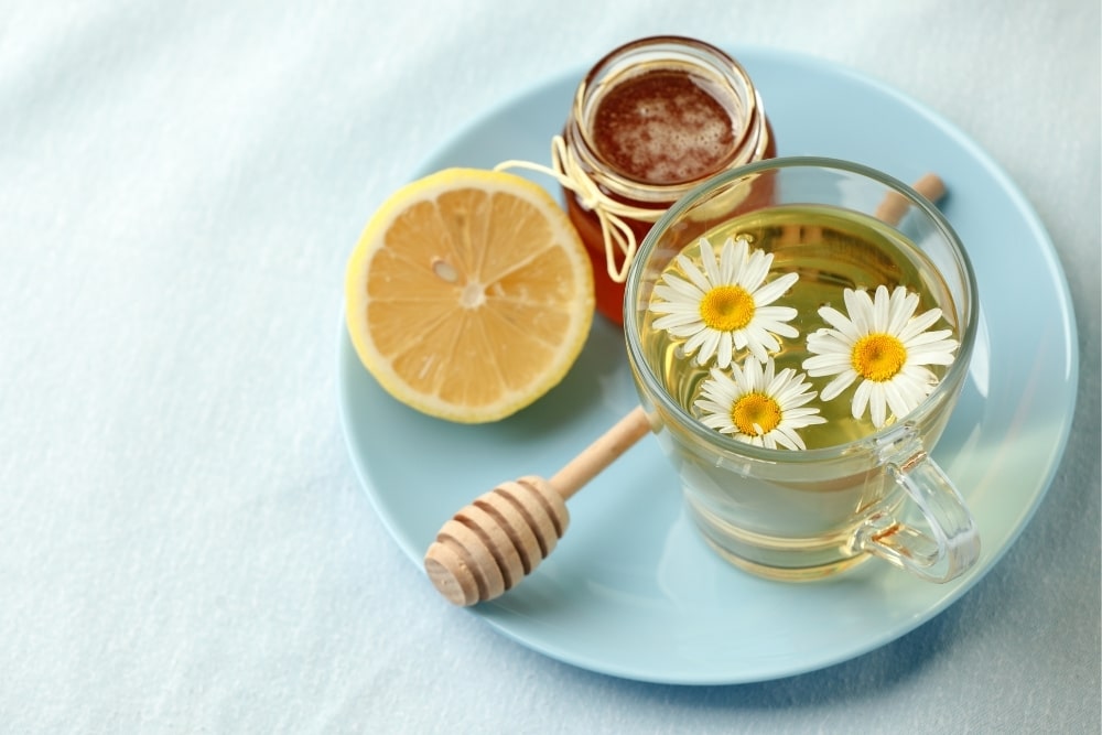 chamomile tea cup with honey