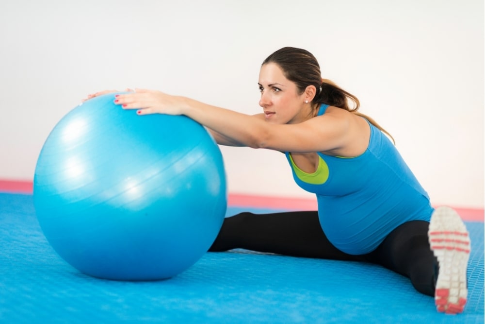 pregnant exercise stretch