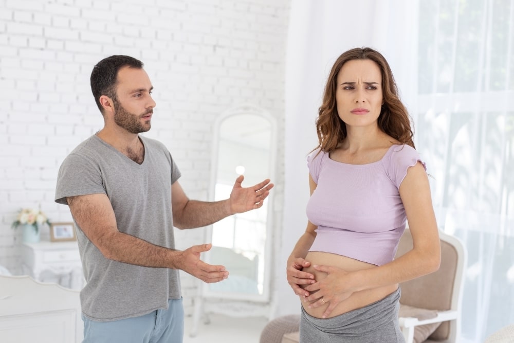 pregnant woman argue couple man