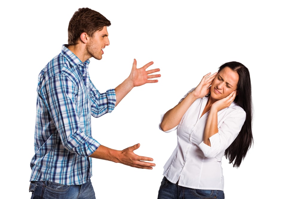 Aggressive man overpowering his girlfriend-min