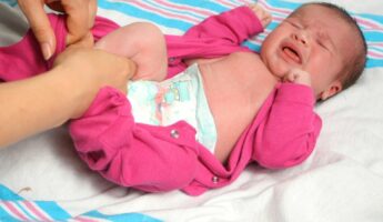 9 Ways To Get Through Diaper Changes When Baby Hates Them