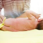 Are Black Specks or Spots In Baby Poop Normal?