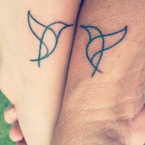 matching bird tattoos